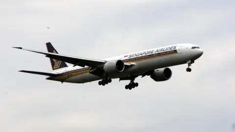 PA Singapore Airlines Boeing 777 landing at Heathrow Airport previously